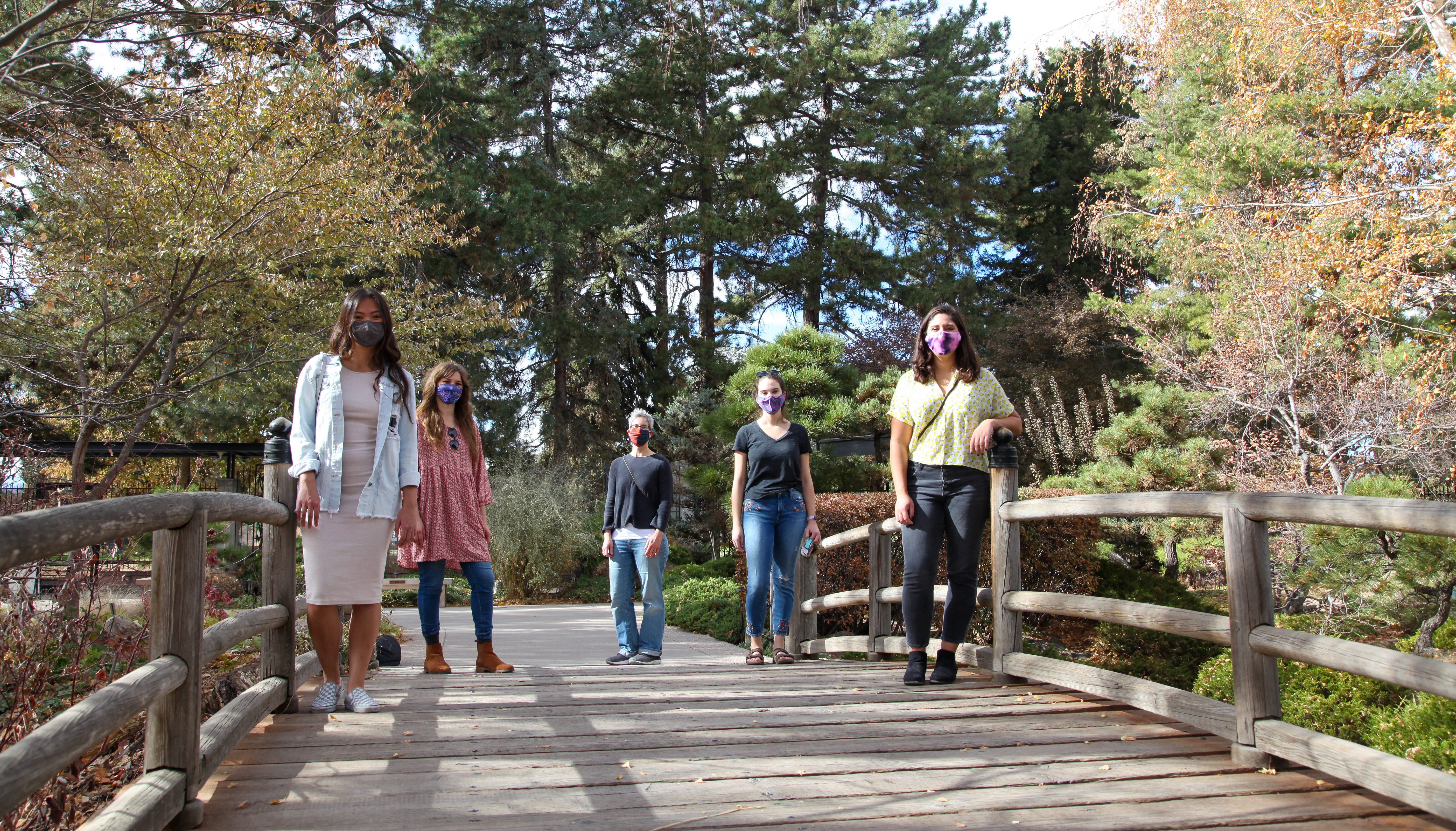 Traumatic Stress Studies Group Team Members standing on a bridge